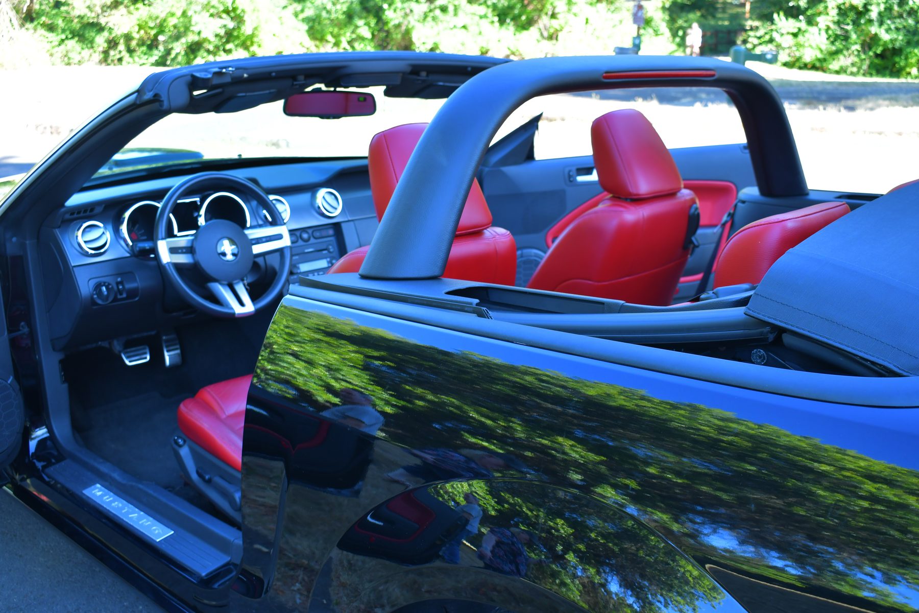 Interior view showing roll bar and dashboard